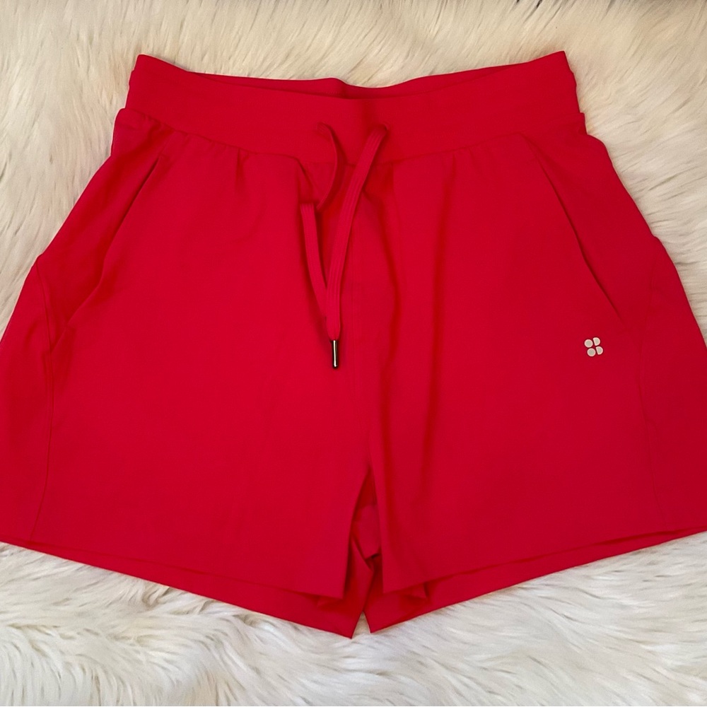 Sweaty Betty Explorer 3.5” Tie Waist Shorts - NWT - Size 8 / Medium - Venus Pink - Picture 2 of 12